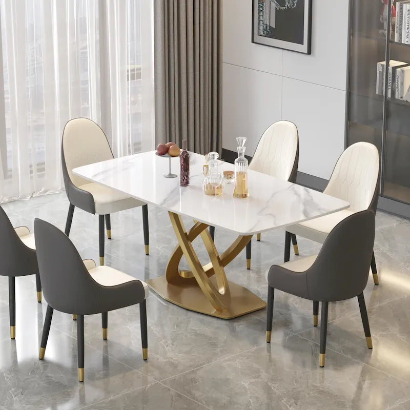 Table à manger moderne avec plateau rectangulaire en pierre frittée et piètement doré