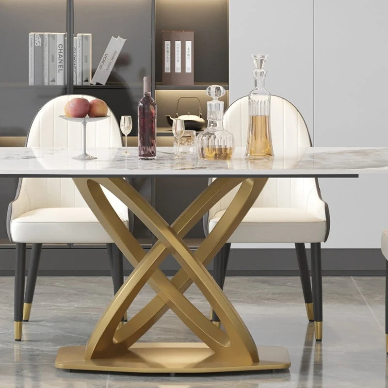 Table à manger moderne avec plateau rectangulaire en pierre frittée et piètement doré