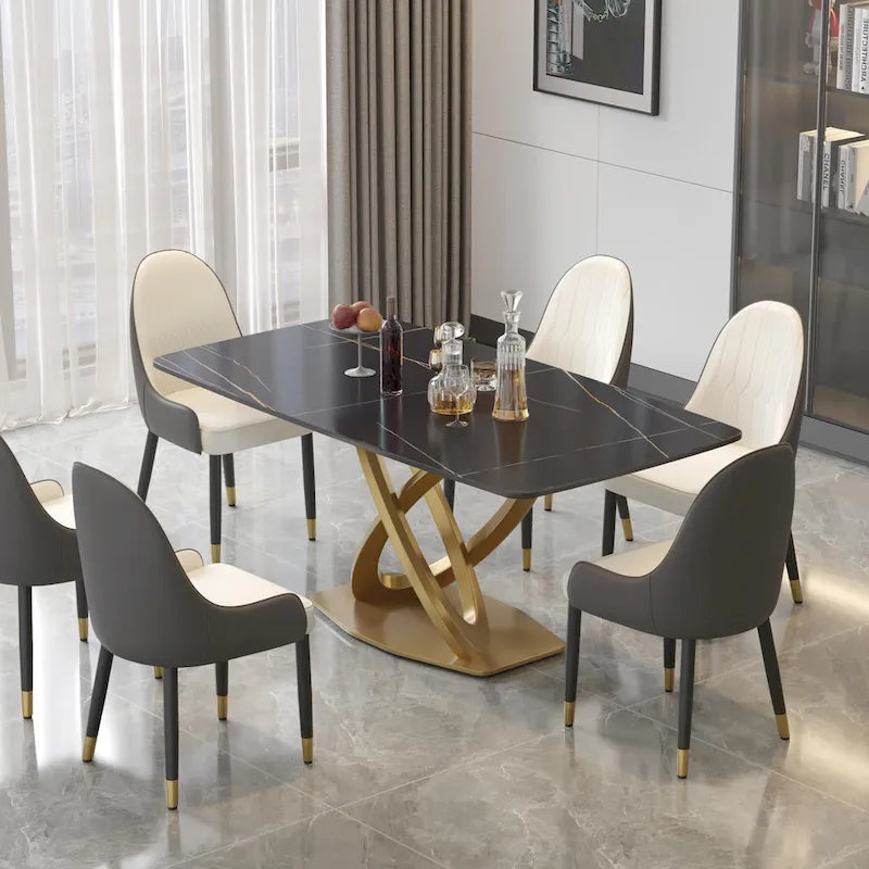 Table à manger moderne avec plateau rectangulaire en pierre frittée et piètement doré