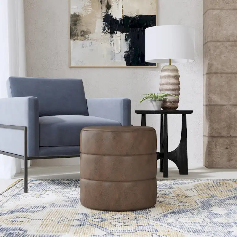 Pouf rond capitonné