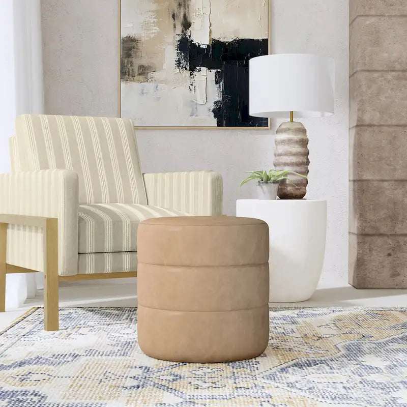 Pouf rond capitonné