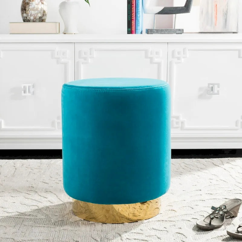 Pouffe en velours bleu marine avec base en laiton