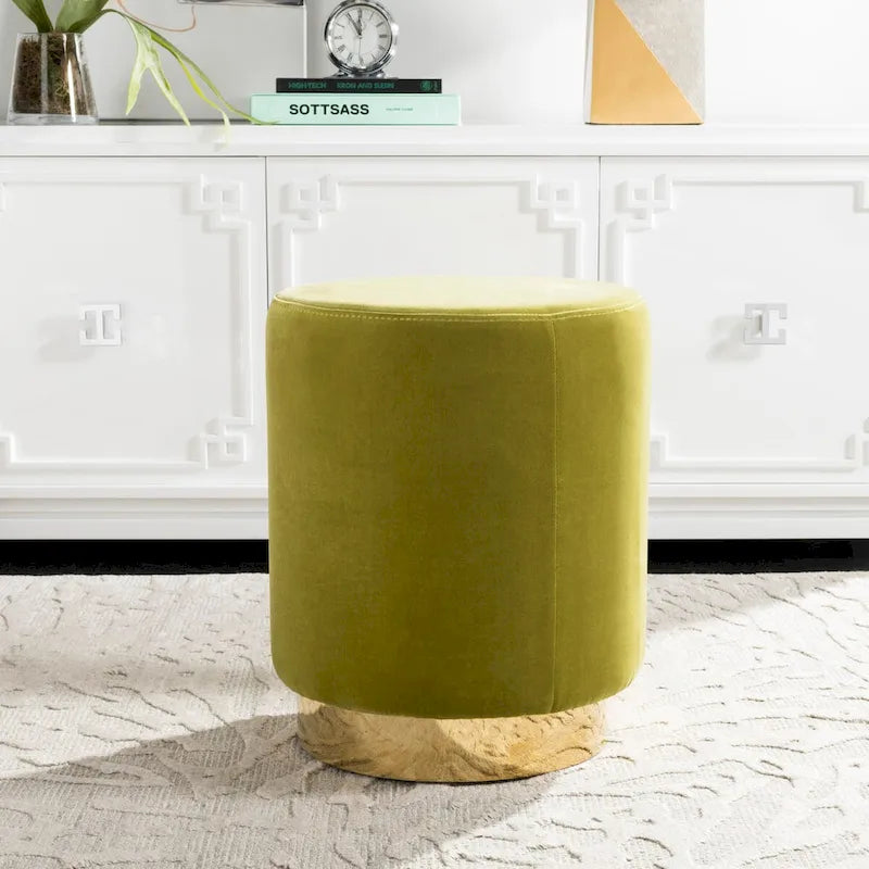 Pouffe en velours bleu marine avec base en laiton