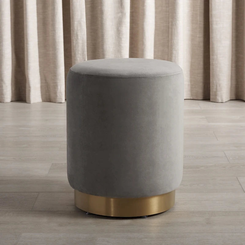 Pouffe en velours bleu marine avec base en laiton