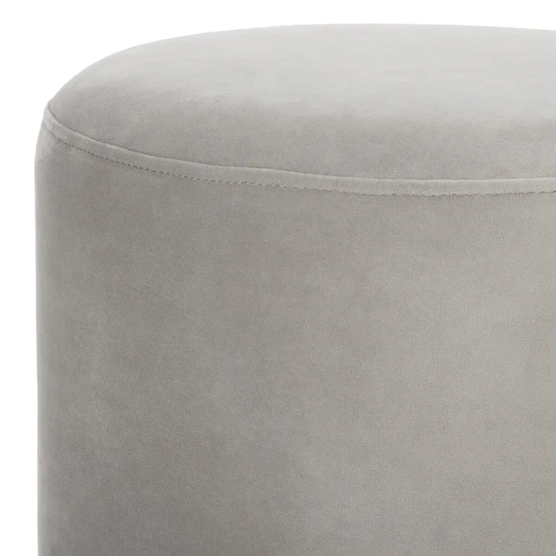 Pouffe en velours bleu marine avec base en laiton